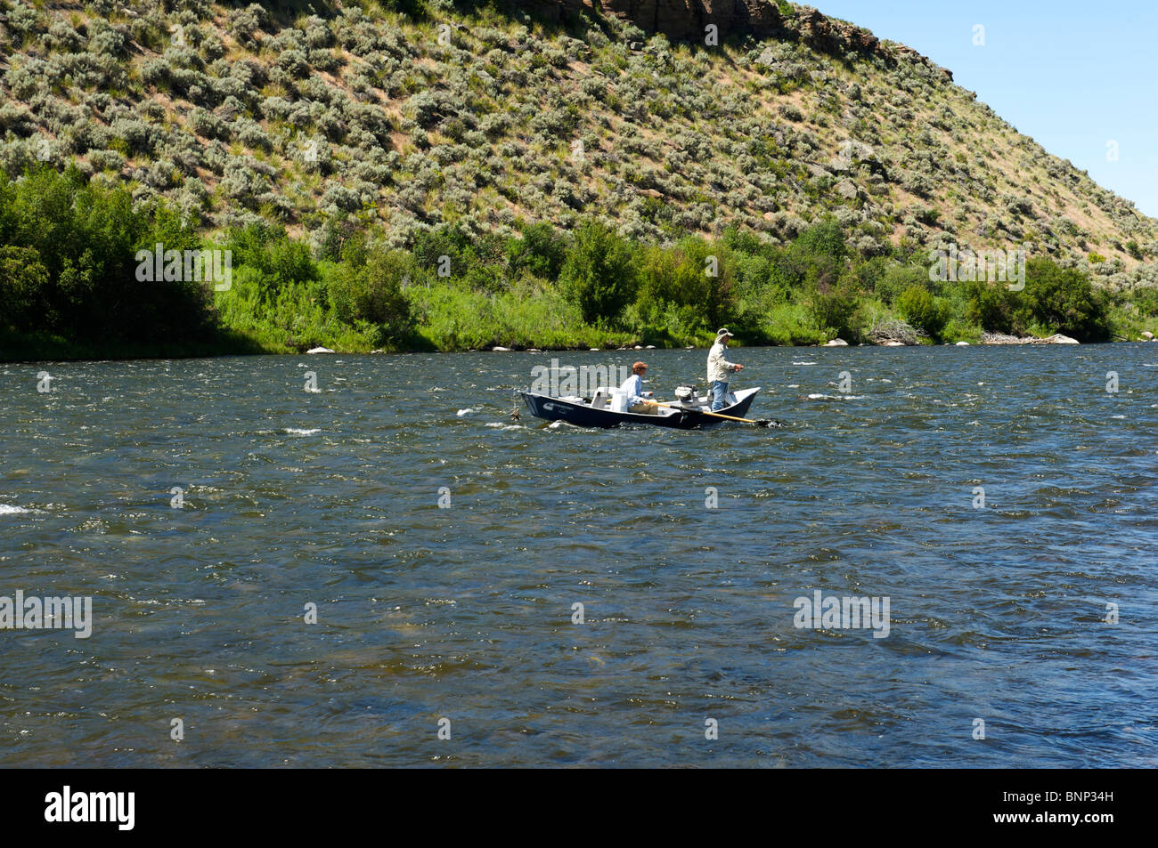 Guided fly fishing from a float boat, Madison River, Montana Stock