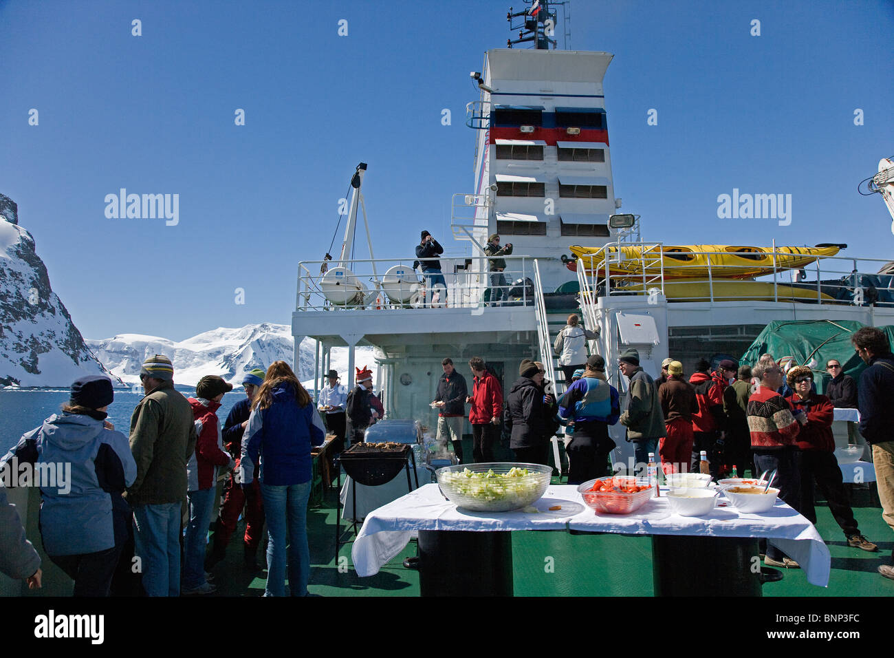 Party on board the Akademik Loffe during antarctic cruise Stock Photo