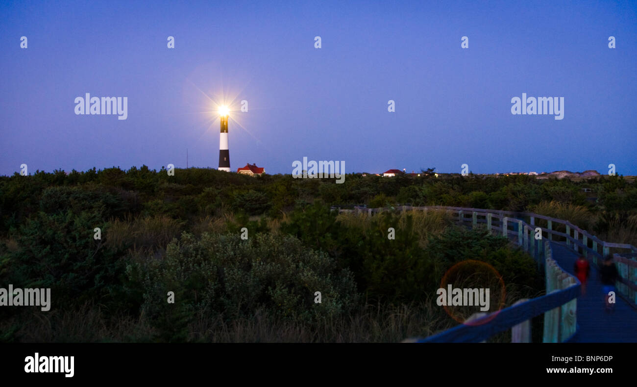 Fire Island lighthouse lit up at twilight Stock Photo