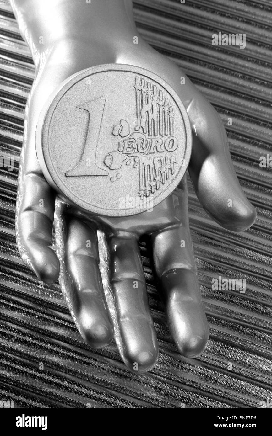 Human Hand Coin Coin holding human hand fingers Black and White Stock Photos & Images ...