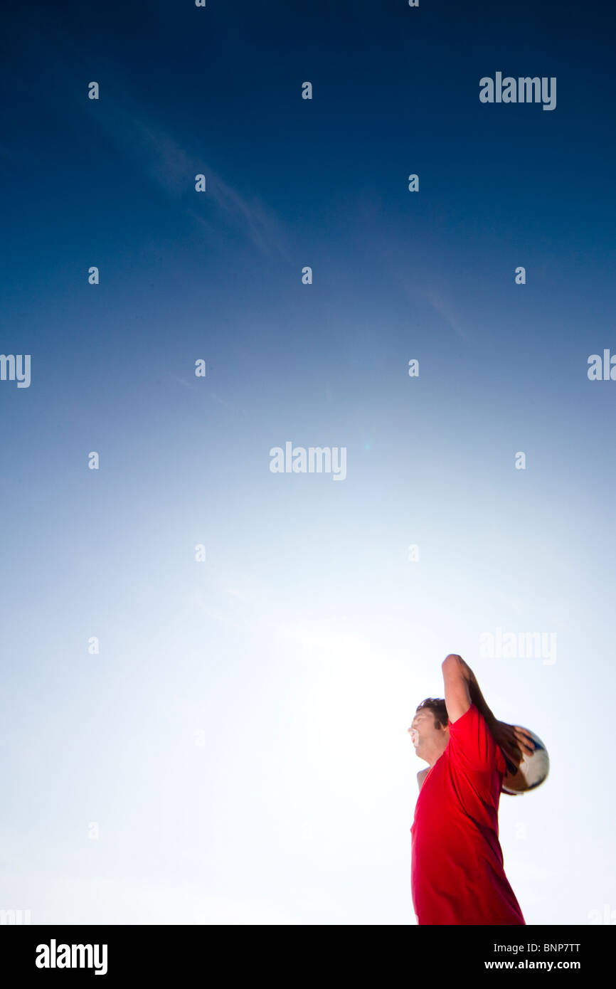Soccer player throwing ball Stock Photo Alamy