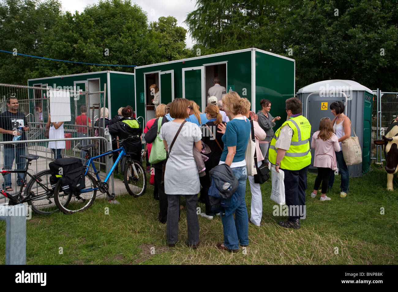 Queue waiting for entry into public toilets at the Nantwich Summer Show