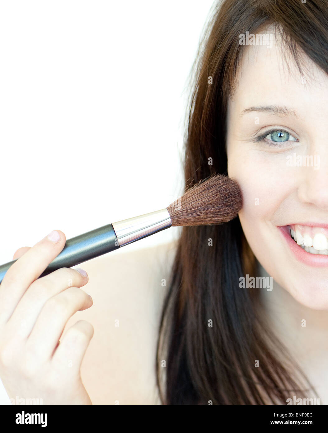 Woman using blush brush apply hi-res stock photography and images - Alamy