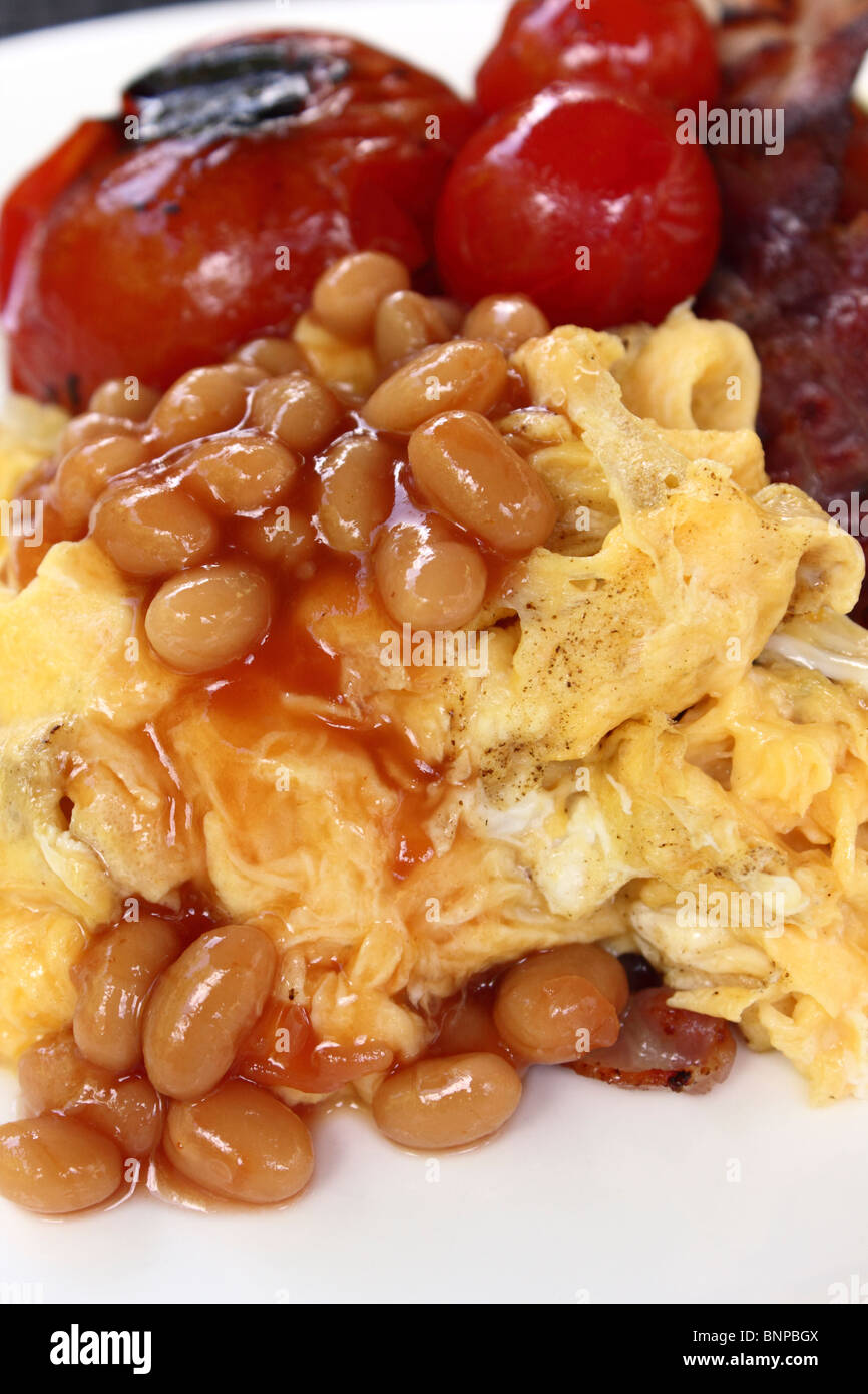 Scrambled eggs baked beans tomatoes Stock Photo Alamy