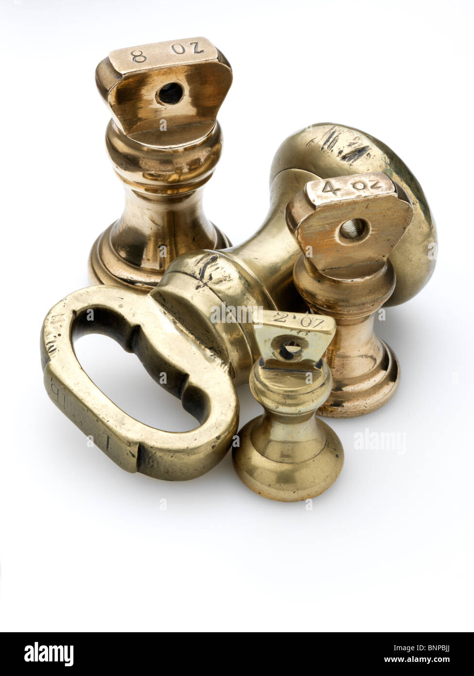 Antique brass weights Stock Photo