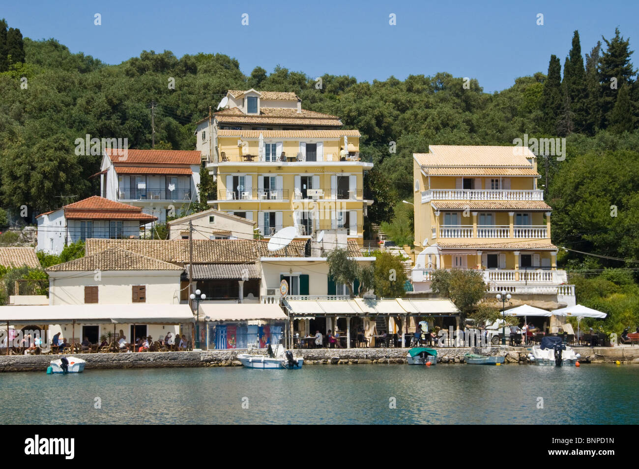 Holiday apartments overlooking harbour at Kassiopi on the Greek