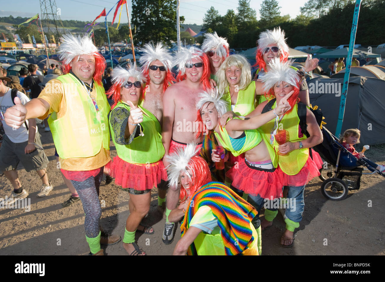 Glastonbury Festival. Group of friends in similar fancy dress costumes  Stock Photo - Alamy