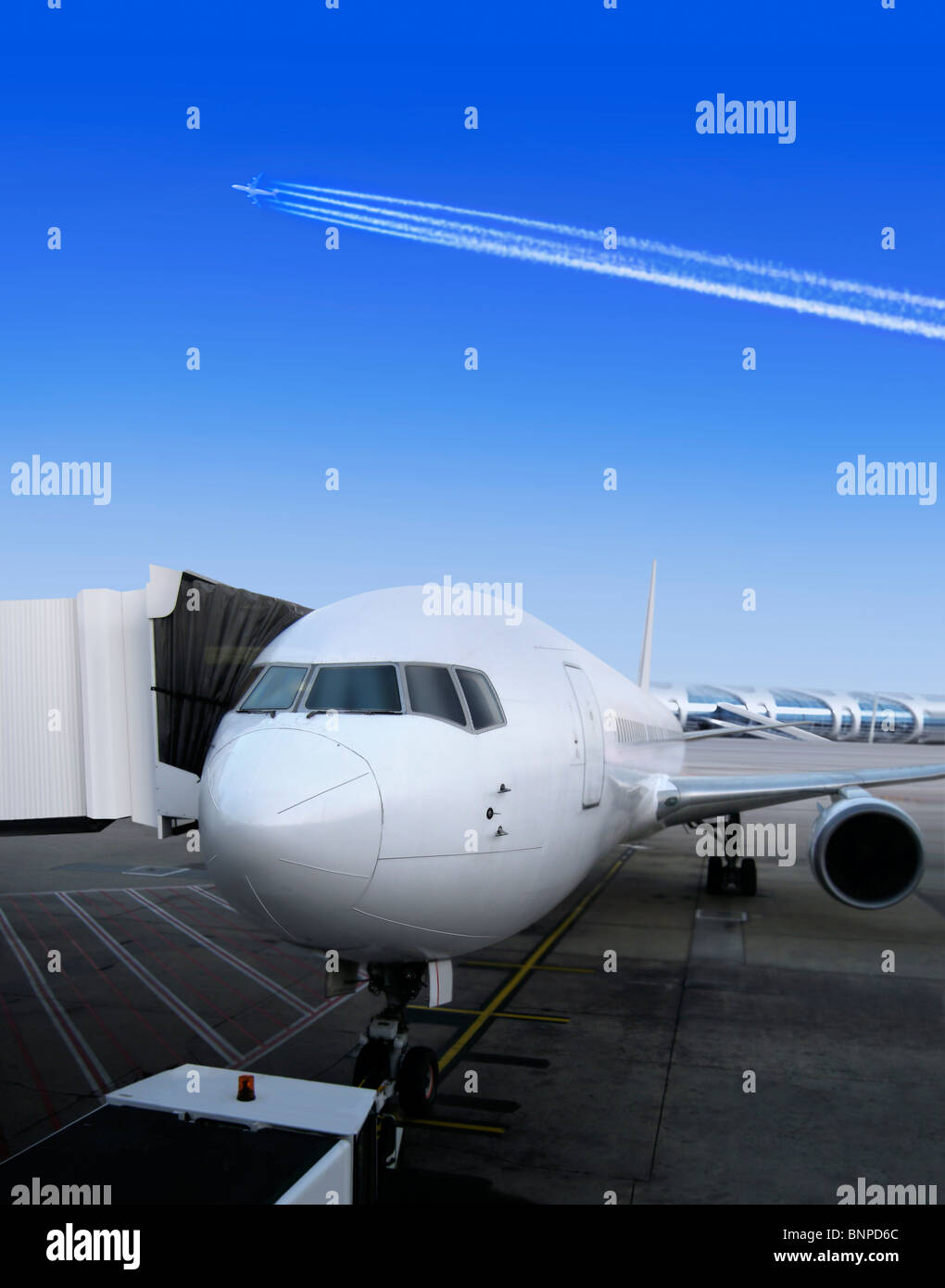 Plane parked together with door embarks, for the next flight Stock Photo