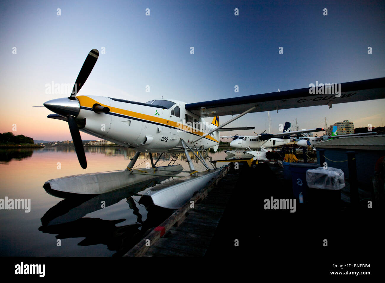 Otter sea plane at dock in Victoria BC Canada - early morning Stock Photo