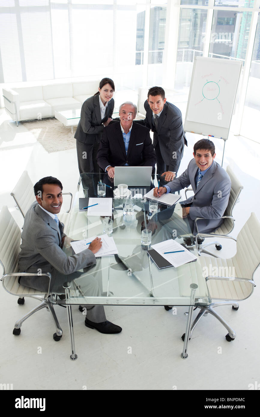 A diverse business team smiling at the camera Stock Photo - Alamy
