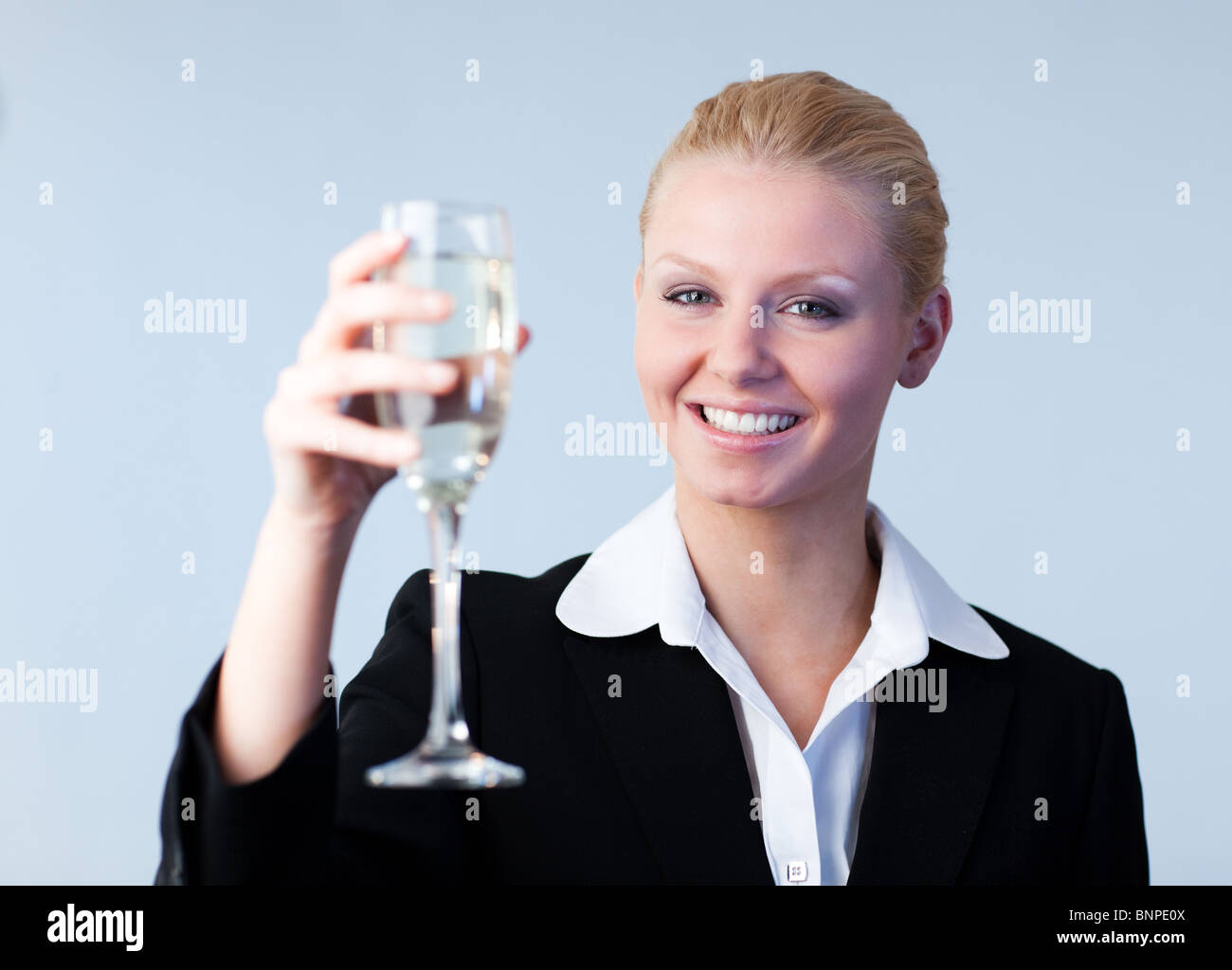 Business woman Holding a Champagne Glass Stock Photo - Alamy