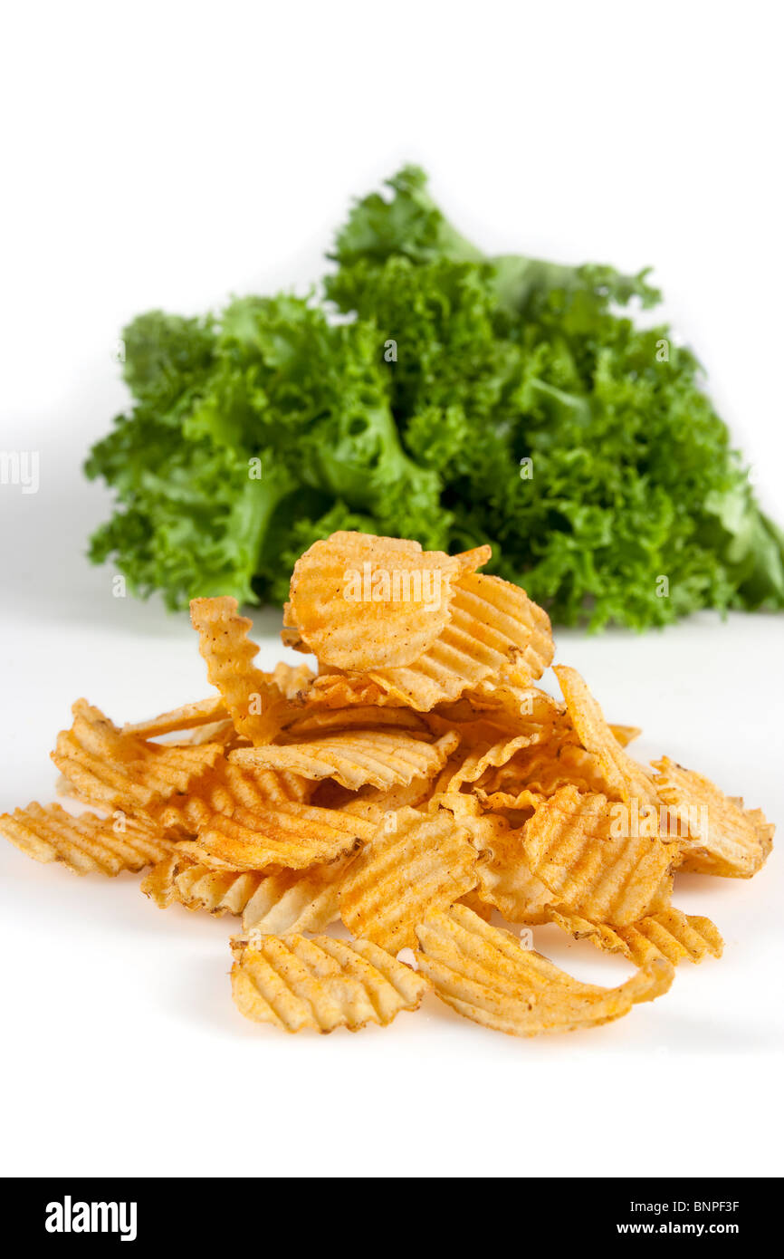 Potato chips and fresh salad Stock Photo Alamy