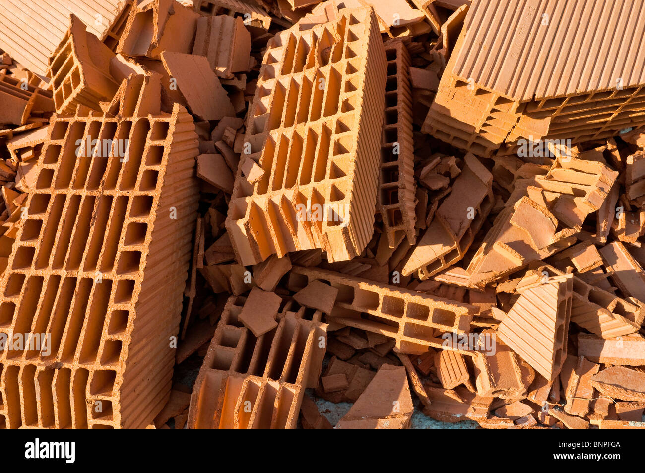 Pile of scrapped broken Bouyer Leroux bio-bricks - France. Stock Photo