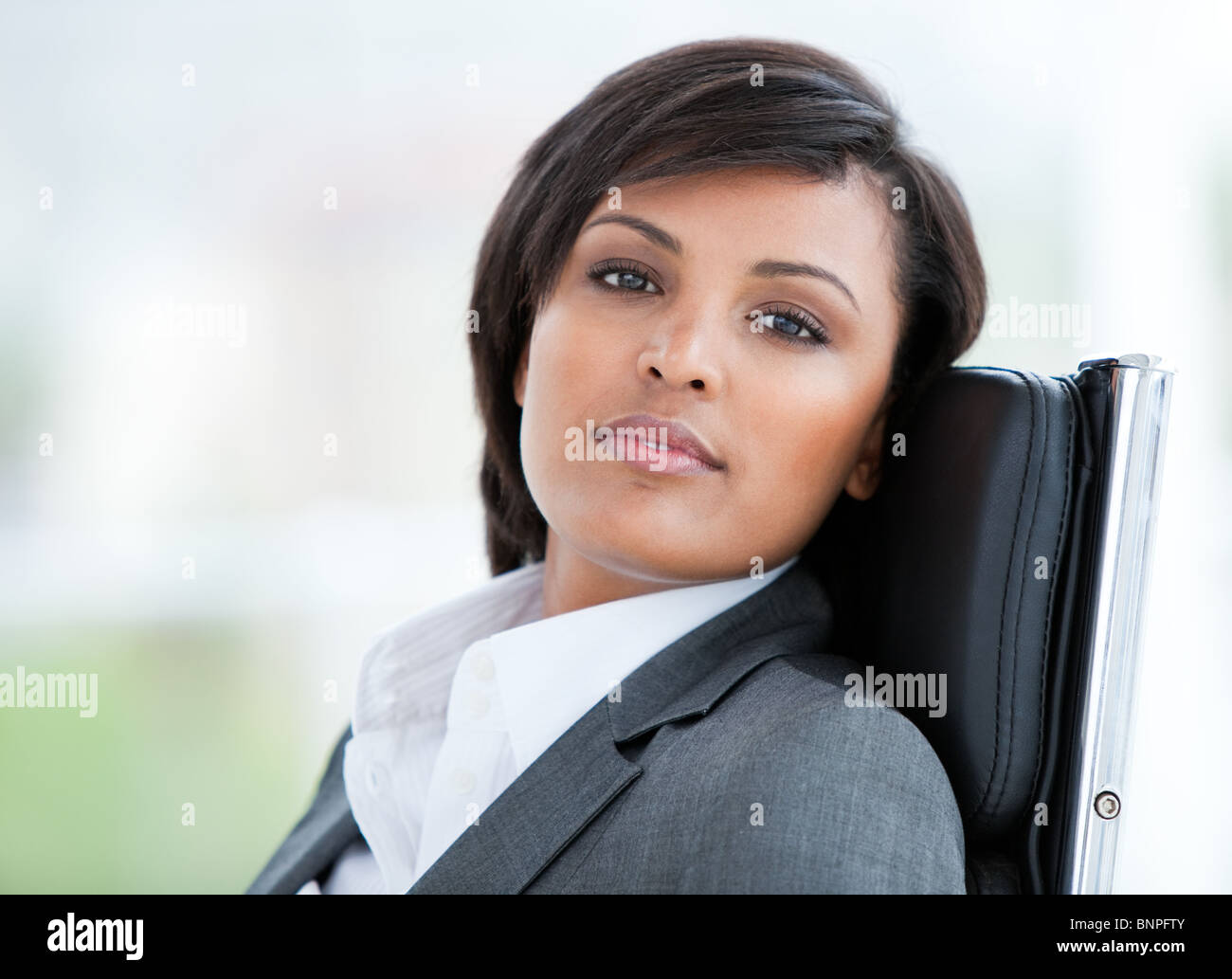 Portrait of a brunette business woman at work Stock Photo - Alamy