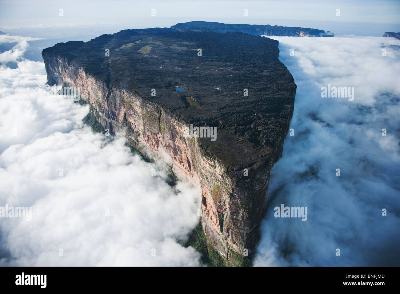 Mount Roraima is the highest tepui reaching 2810 meters in elevation. Cloud covered flat top mountains. Venezuela Stock Photo