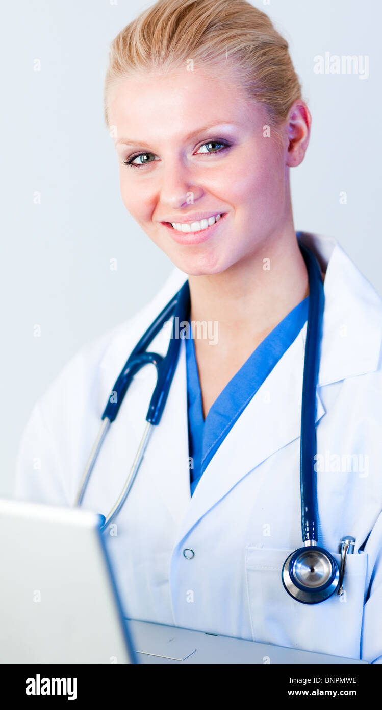Doctor laptop looking camera in hi-res stock photography and images - Alamy