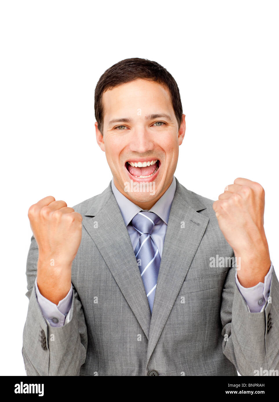 Lucky businessman punching the air in celebration Stock Photo - Alamy