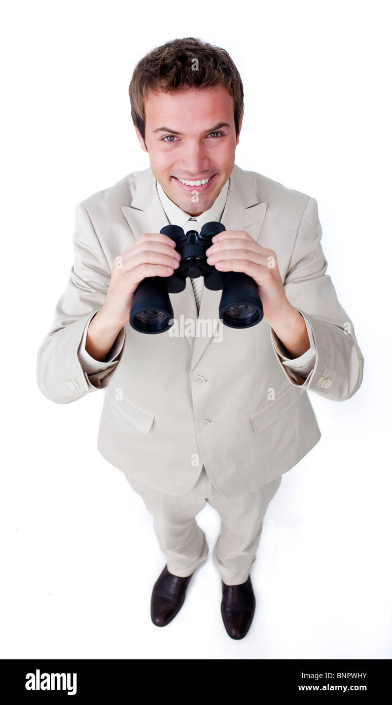 Smiling businessman using binoculars Stock Photo Alamy