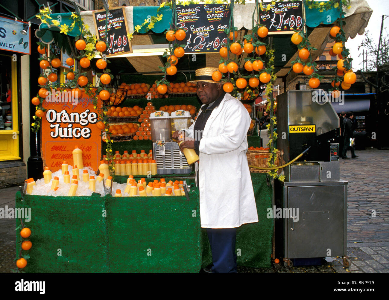 Orange juice vendor, Camden Market, London Stock Photo Alamy