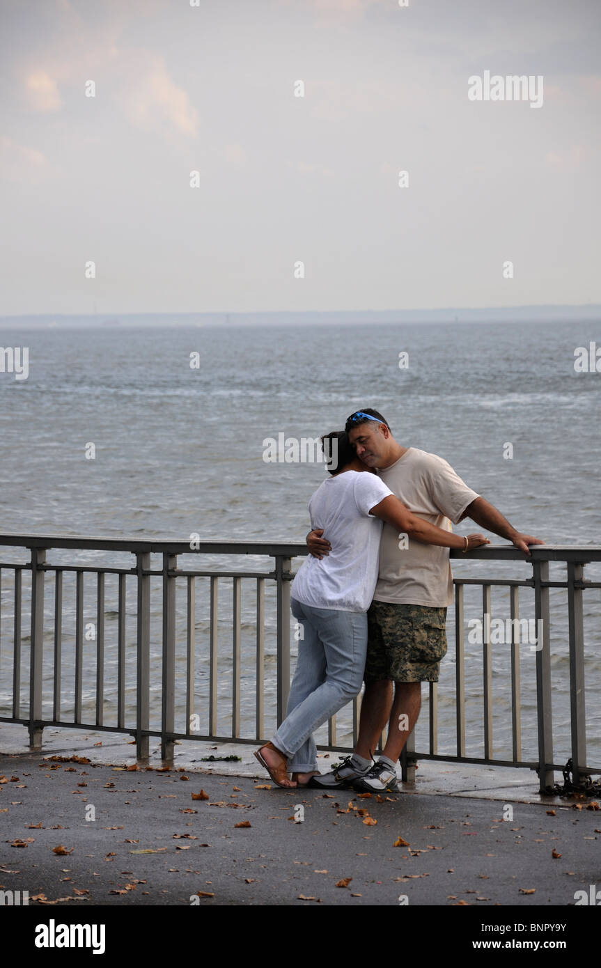Hispanic couple having a romantic evening in New York harbor, NYC, USA Stock Photo