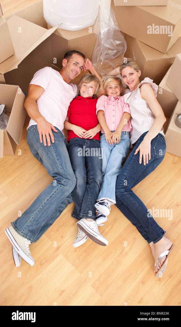 Tired family relaxing moving house hi-res stock photography and images ...