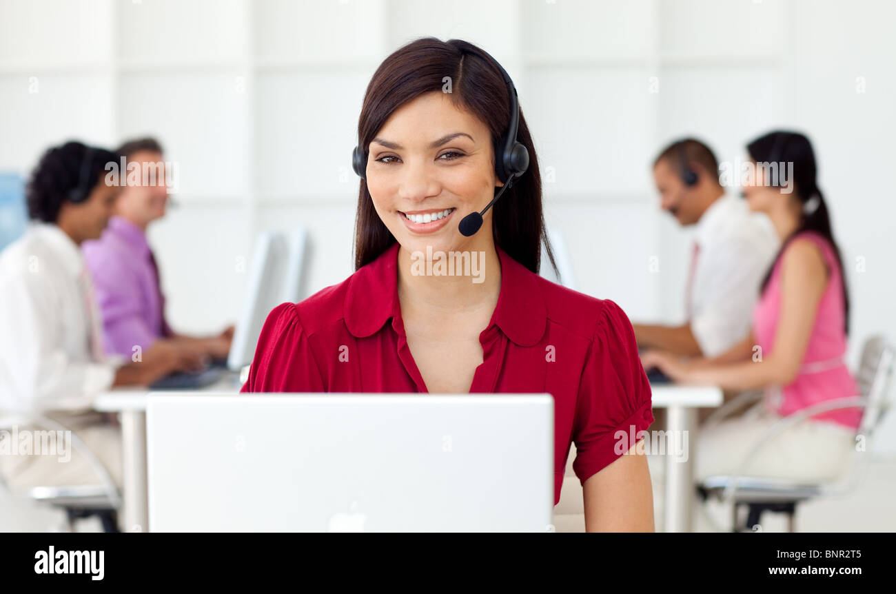 Young Businesswoman using headset Stock Photo - Alamy