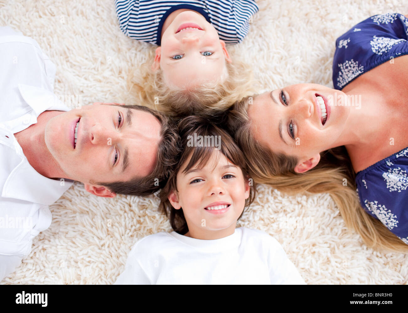 Children lying down in circle hi-res stock photography and images - Alamy