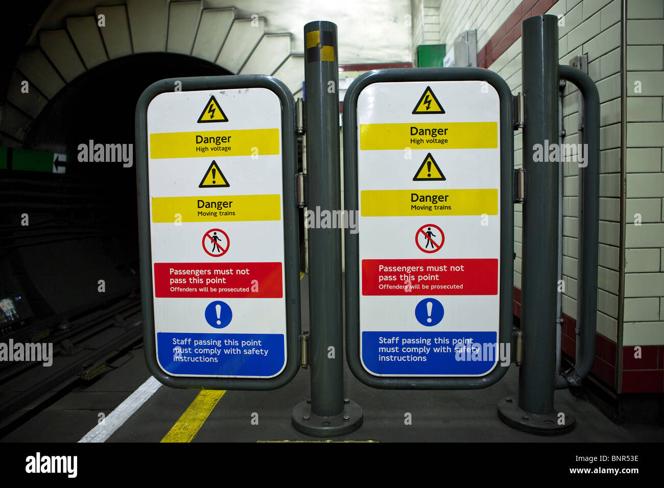 Danger sign and barrier at the end of a London Underground platform
