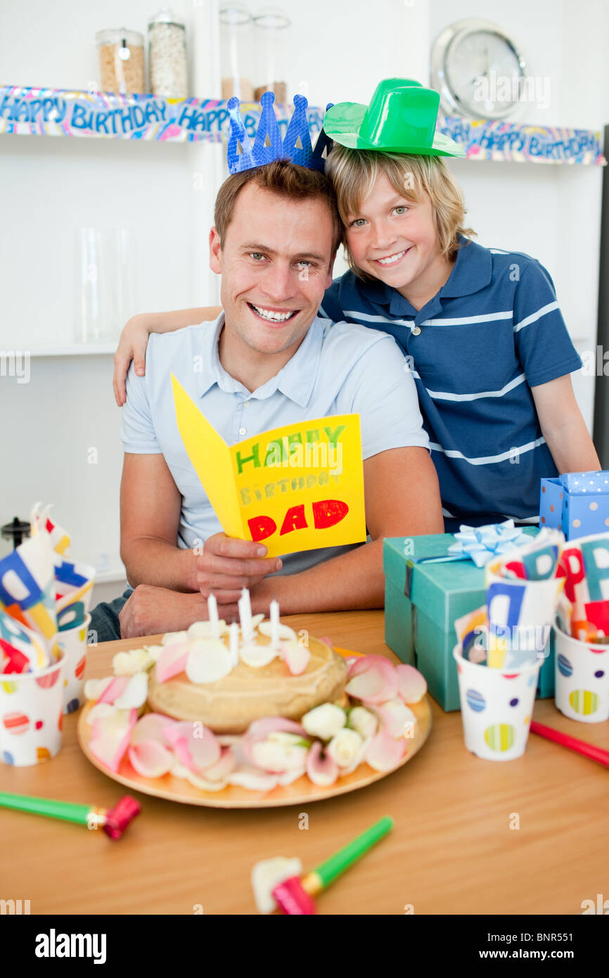 Smiling father celebrating hi…