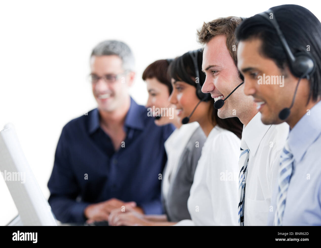 Mature manager checking his team's work Stock Photo - Alamy