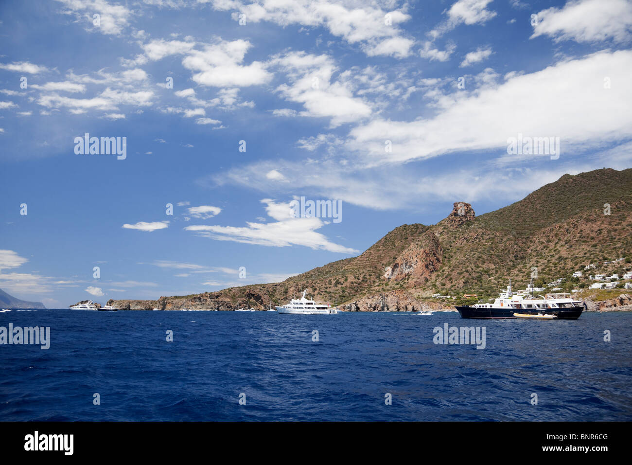 Large yachts anchoring off the island Panarea of Aeolian Islands