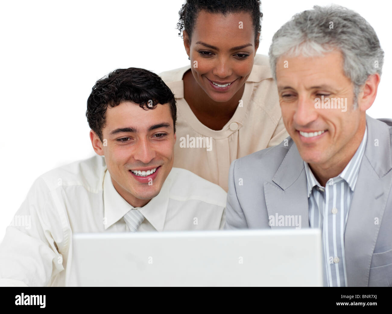 Positive business partners working at a computer Stock Photo - Alamy