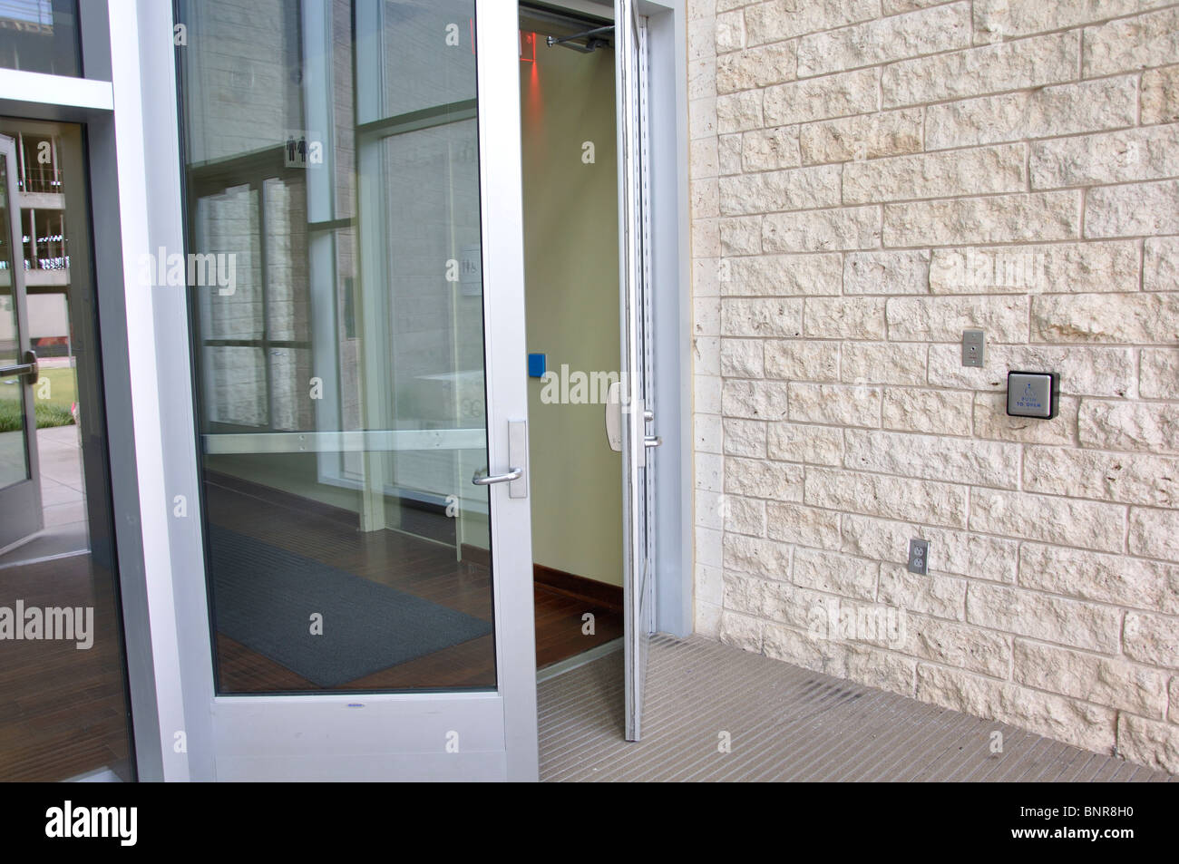 Disabled access to building automatic doors Stock Photo Alamy