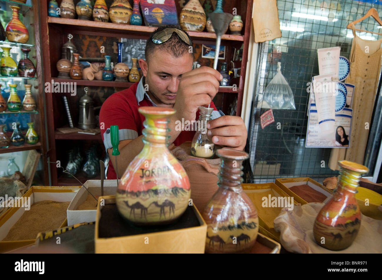 Artist Making Colored Sand Bottle Stock Photo Alamy