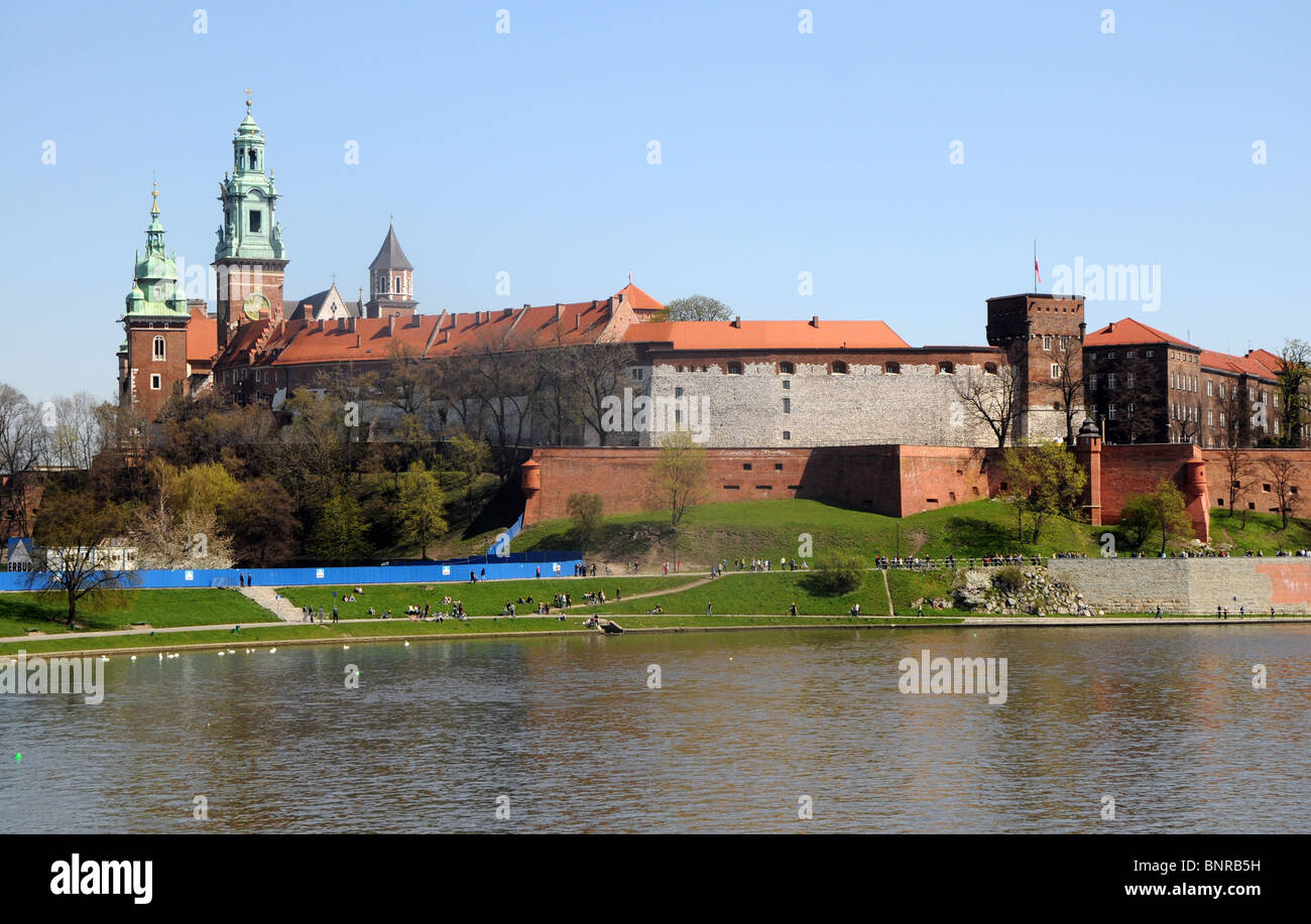 Wawel architectural complex with Wawel Castle and Cathedral turrets and Vistula River in Cracow, Poland Stock Photo