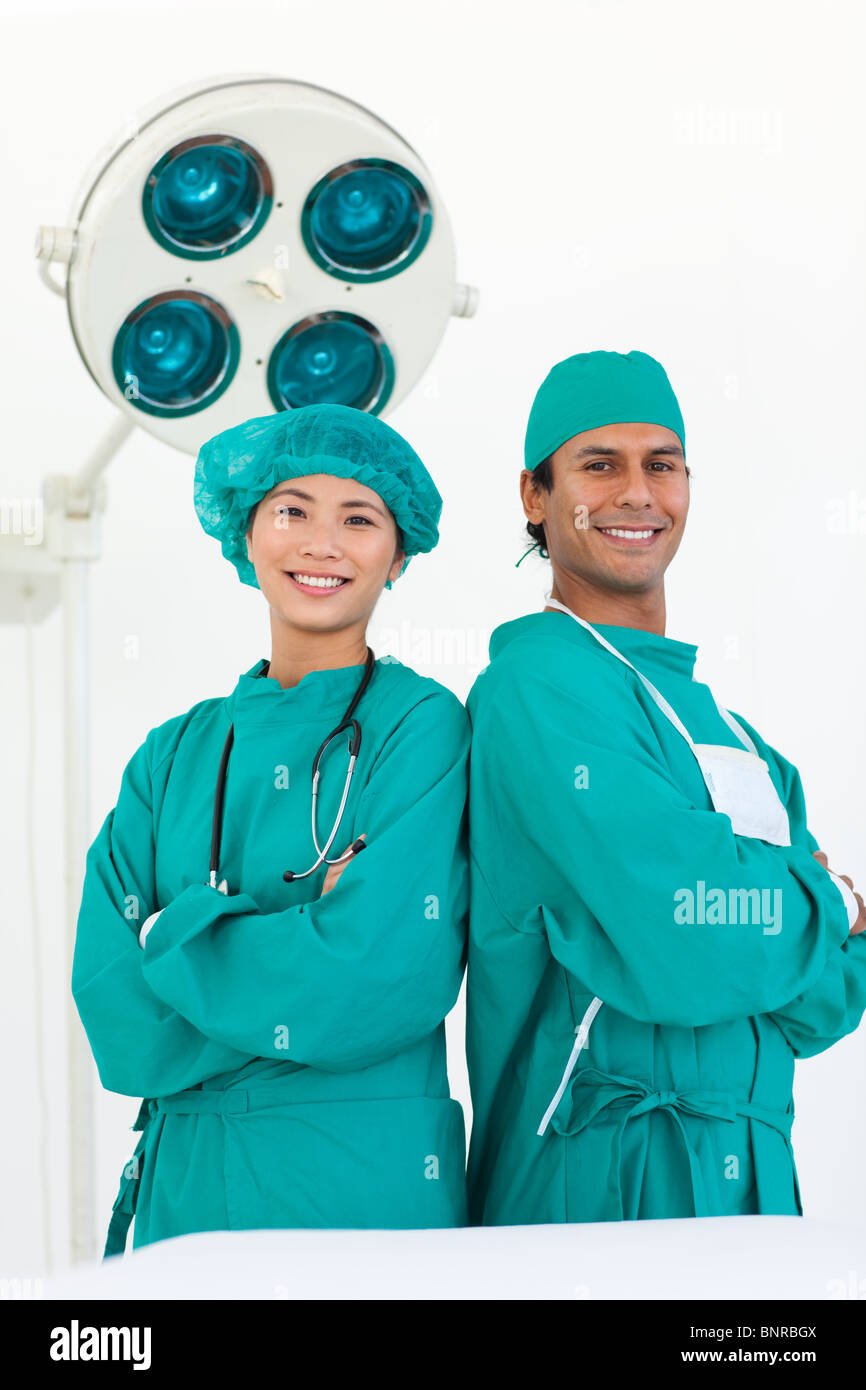 Two doctors wearing surgical gown Stock Photo Alamy