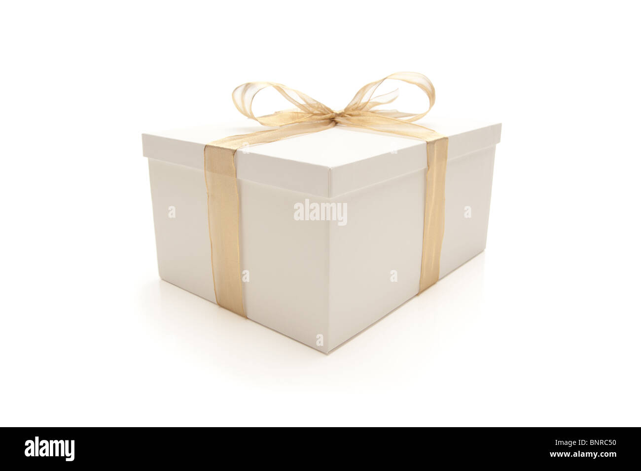 White Gift Box with Gold Ribbon and Bow Isolated on a White Background ...