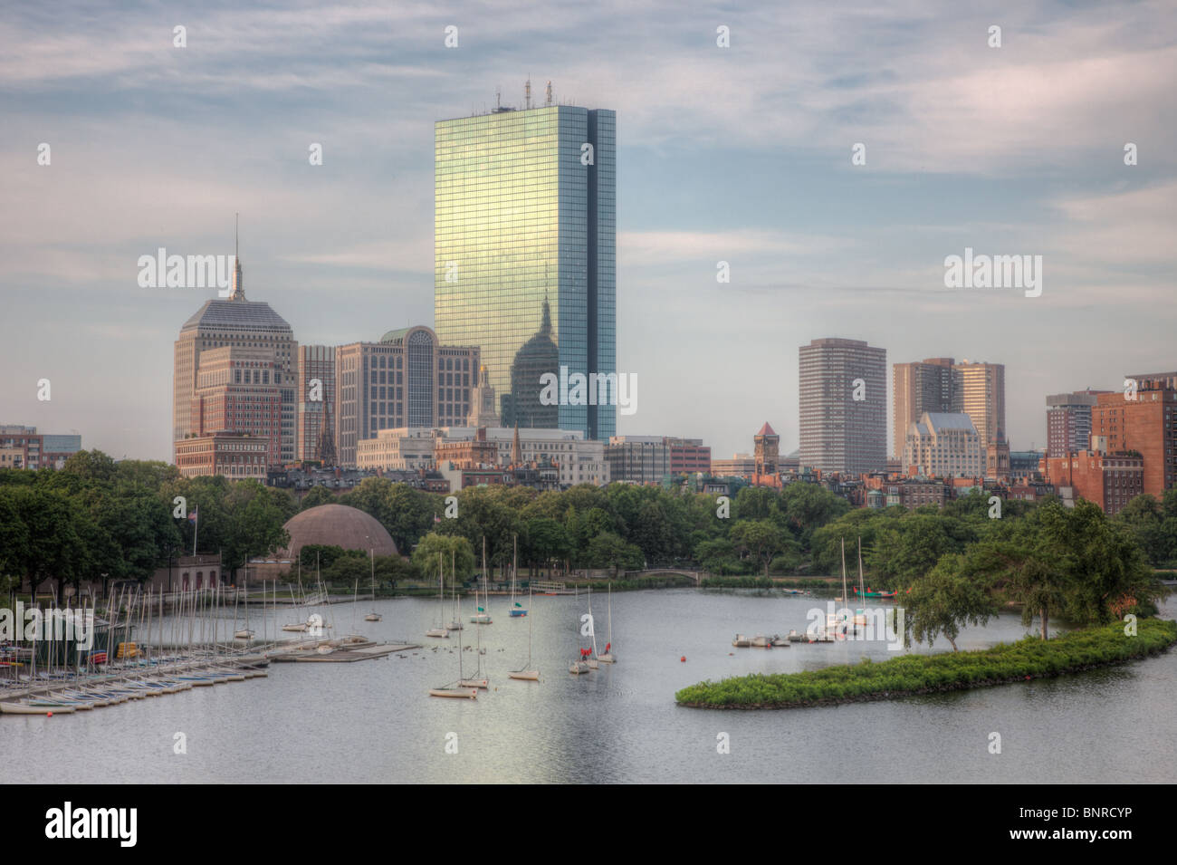 The Boston skyline including the John Hancock building, as seen over the Charles River from the Longfellow Bridge. Stock Photo