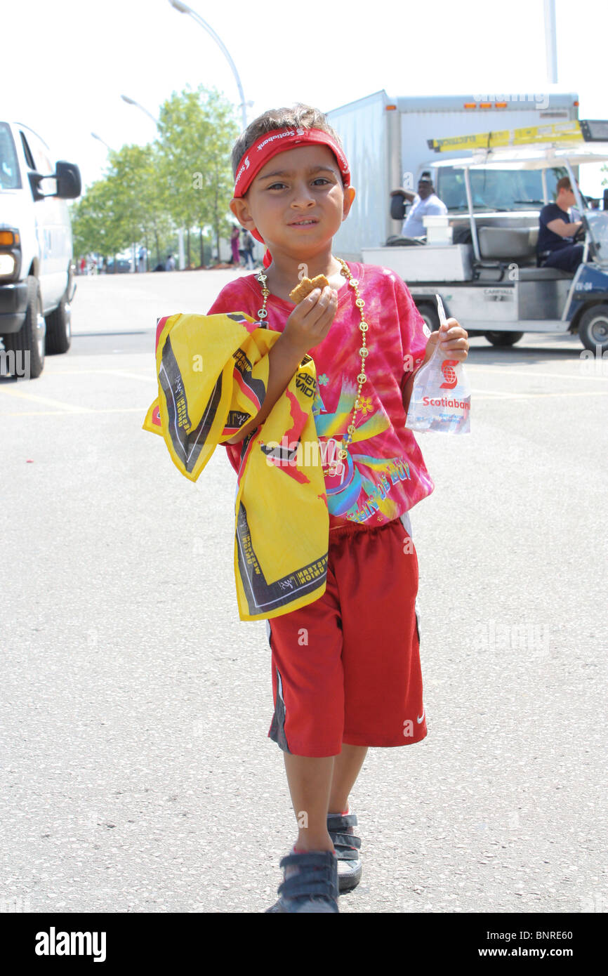 happy young trinidad boy walking outdoor summer Stock Photo Alamy