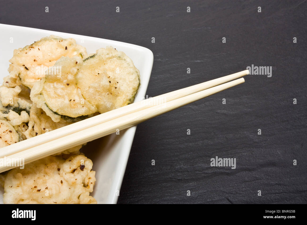 Deep fried courgette covered in tempura batter Stock Photo Alamy