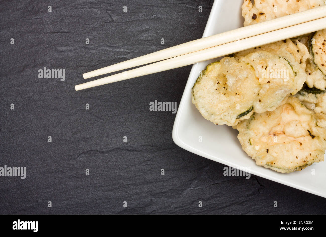 Deep fried courgette covered in tempura batter Stock Photo Alamy