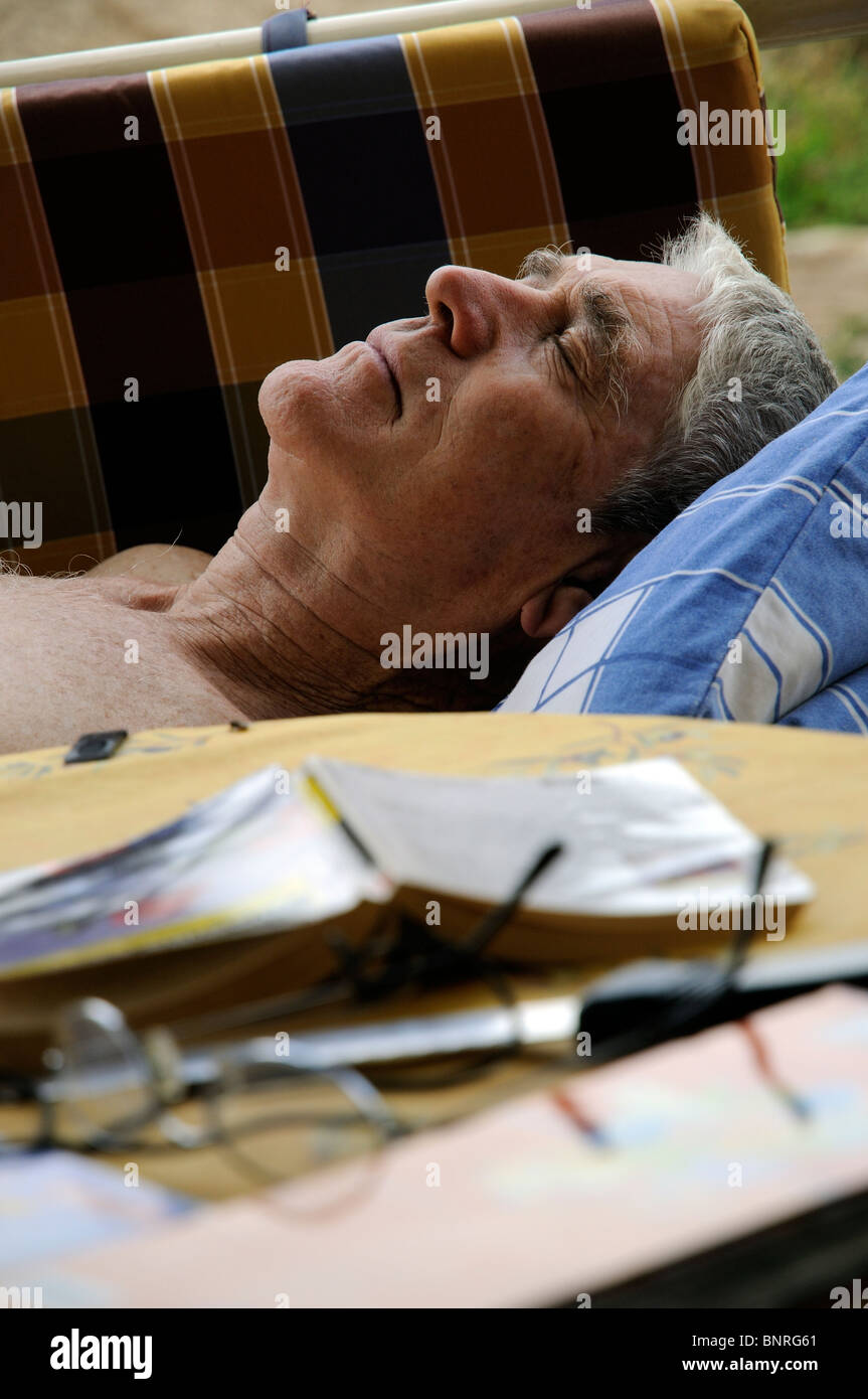Portrait of a man taking a nap Stock Photo - Alamy