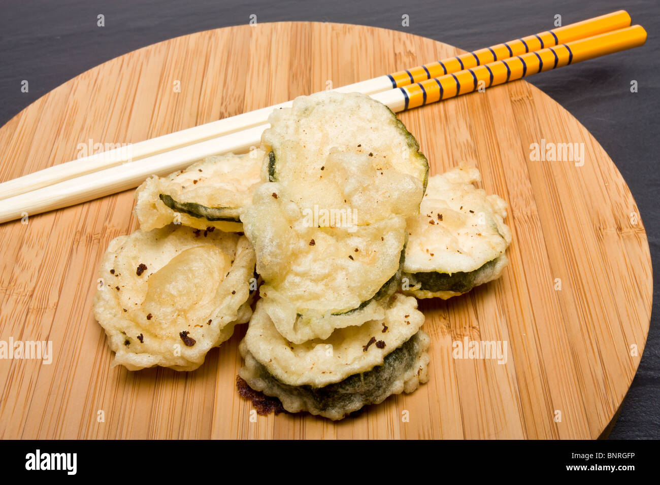 Deep fried courgette covered in tempura batter Stock Photo Alamy