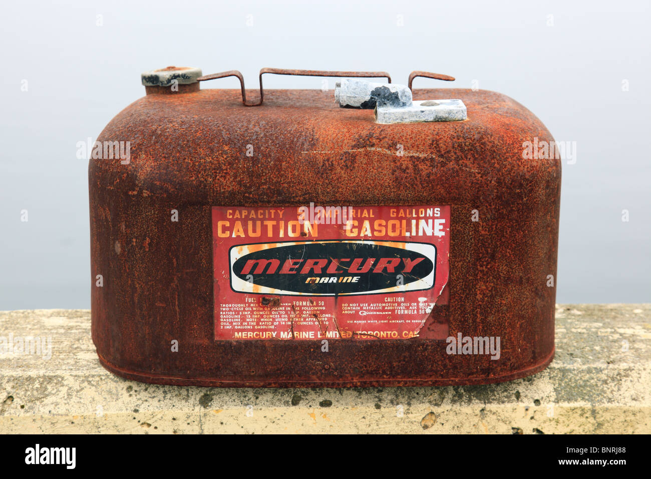 old rusted mercury gasoline tank at port of of Nova Scotia, Canada. Photo by Willy Matheisl