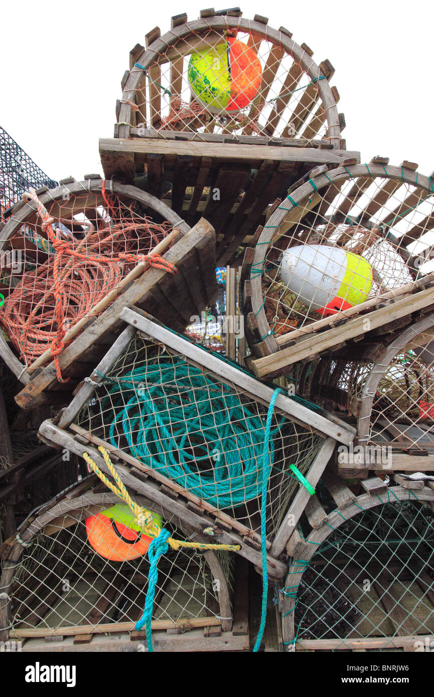 stacked old traditional wooden lobster traps at storage at Nova