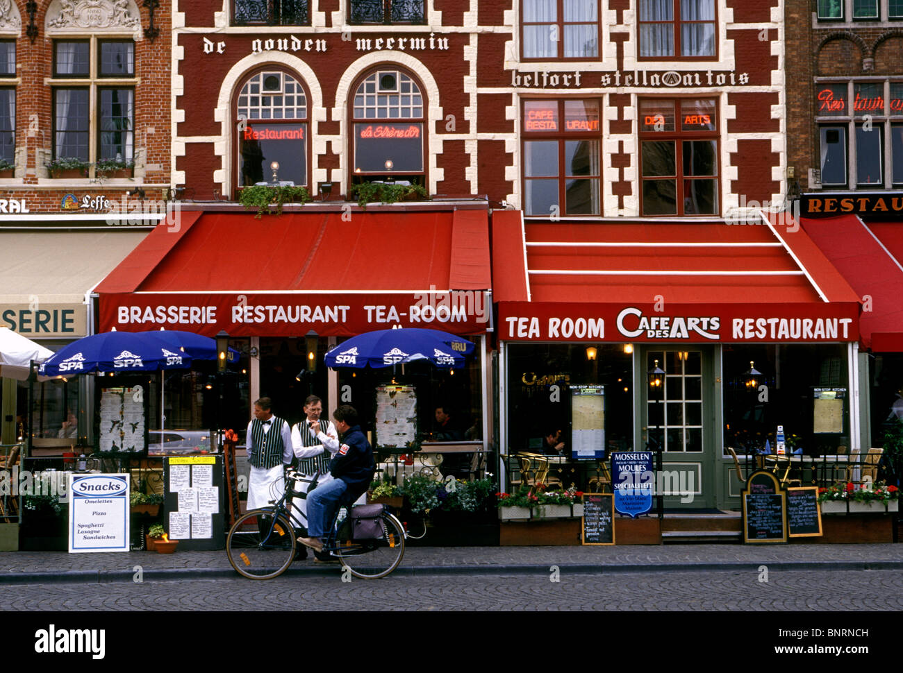 Belgians, Belgian people, waiter, waiters, restaurant, brasserie, tea room, Markt, Market Square, city of Brugge, West Flanders Province, Belgium Stock Photo