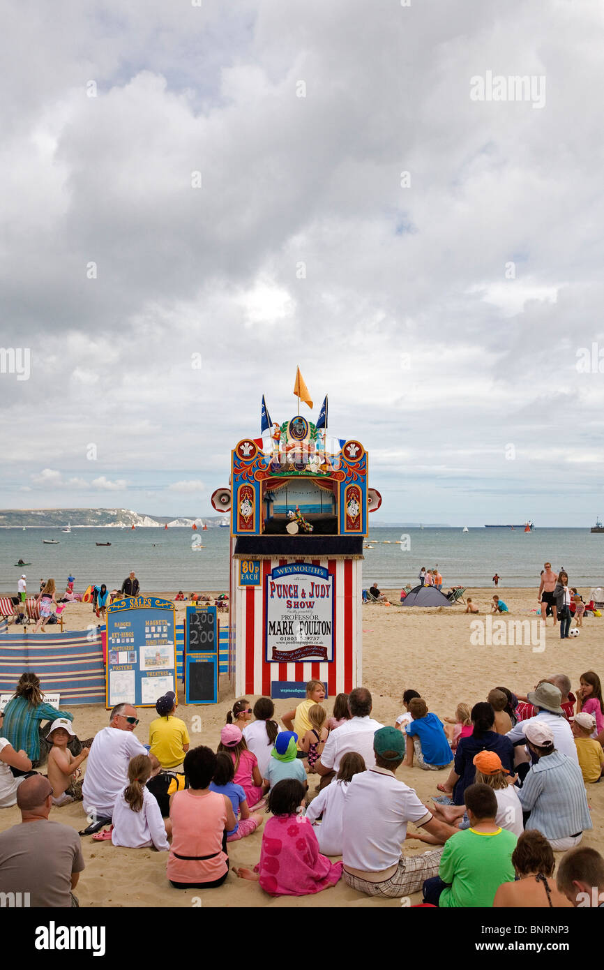 Traditional Punch & Judy show on Weymouth beach Stock Photo