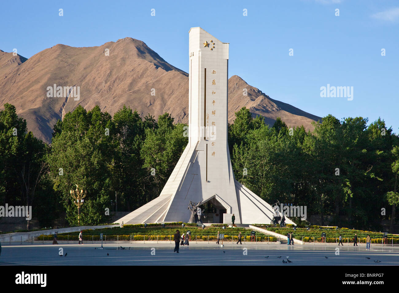 Monument to People's Liberation of TIbet in Potala Square in Lhasa, Tibet Stock Photo