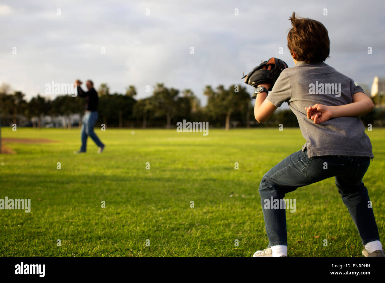 Child Throwing Ball Throw High Resolution Stock Photography and Images