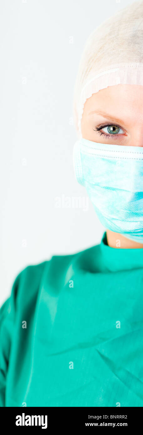 Beautiful female surgeon with a mask Stock Photo - Alamy